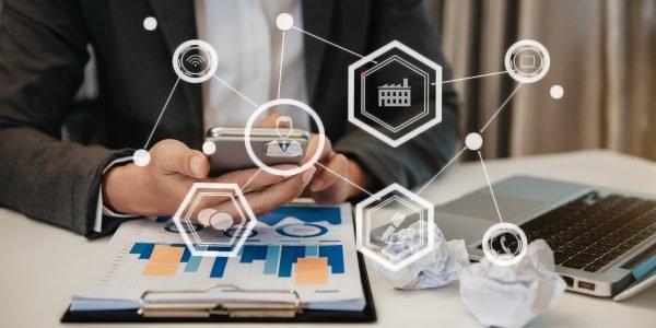 businessman-hand-working-digital-marketing-media-virtual-screen-with-mobile-phone-modern-compute-with-vr-icon-diagram-office (1)