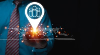 businessman-holding-smartphone-with-virtual-human-icon-location-hand-business-customer-relationship-management-customer-service-digital-marketing-online (1)