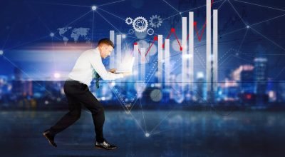 businessman-runs-fast-with-growth-chart-background (1)